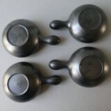 Lot of 4 black and colored ceramic cups