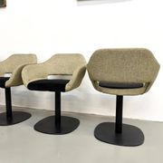 Series of six swivel chairs with organic shell, mottled fabric and base dis