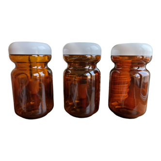 3 jars / jars covered in amber glass