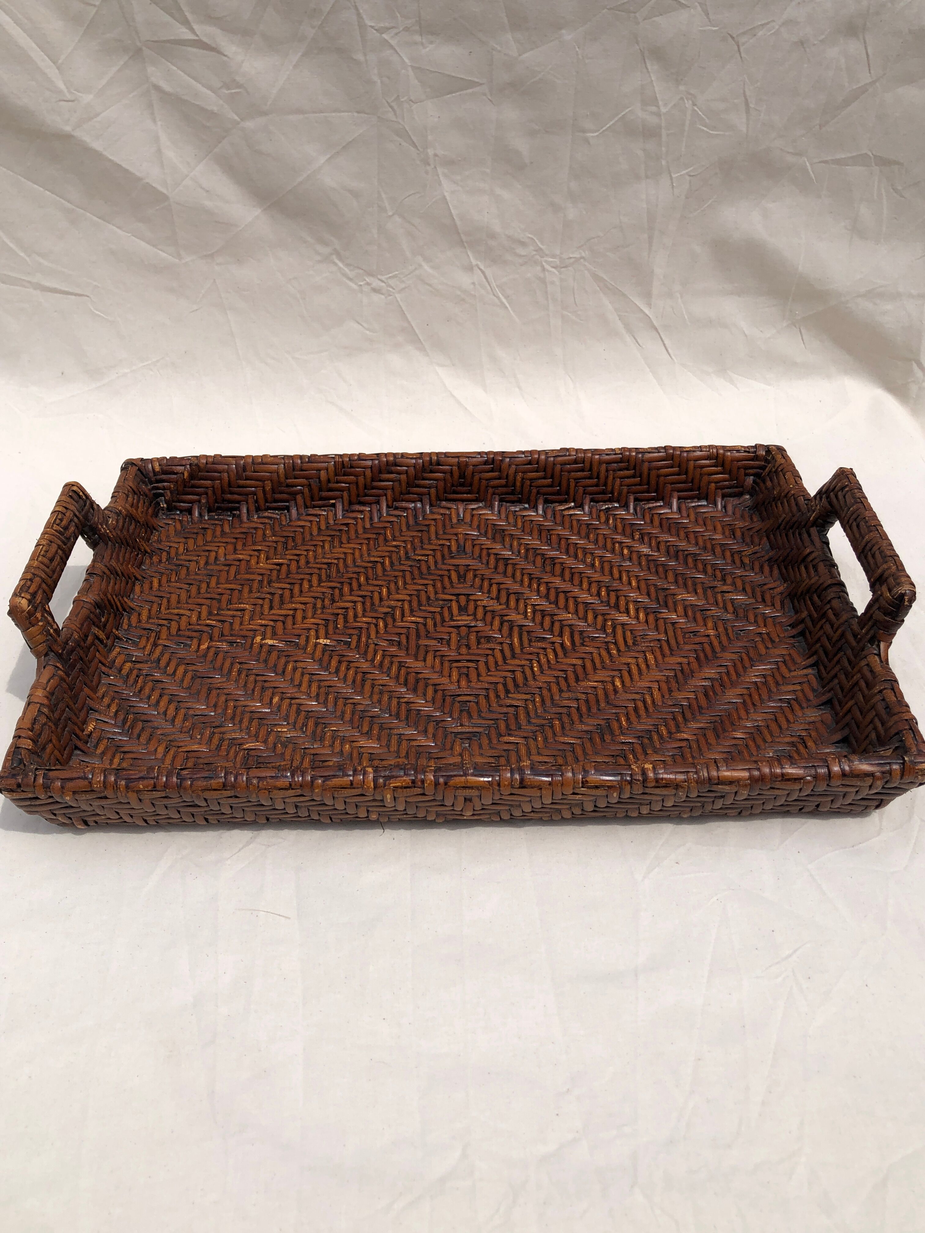 Pair of dark rattan trays