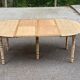 Round dining table with extendable leaves, Louis Philippe style, stripped in raw oak.