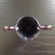 Iridescent black baroque vase