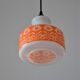 Seventies chandelier in white opaline decorating orange flowers