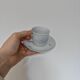 11 cups and saucers