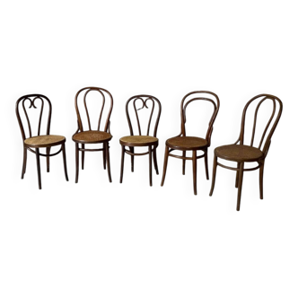 Set of 5 bentwood bistro chairs with caning.