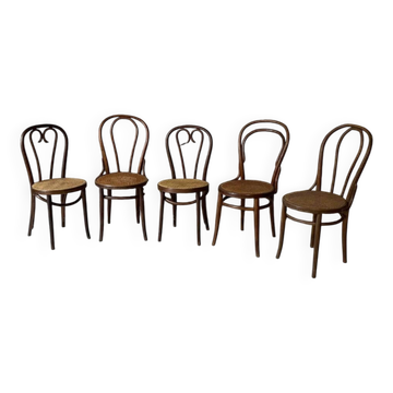 Set of 5 bentwood bistro chairs with caning.