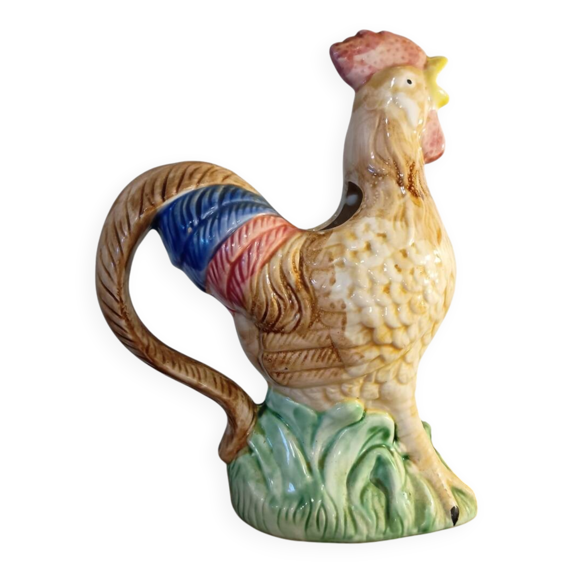 Vintage slipware jug in the shape of a rooster.