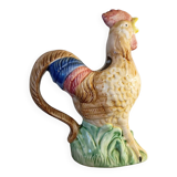 Vintage slipware jug in the shape of a rooster.