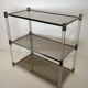 Lucite Shelf with Three Smoked Glass Shelves and Brass Ends. Work