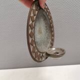 Wall-mounted candlestick in grayish colors, Danish and from the 1970s-80s.