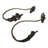 Pair of embraces in numerotée solid brass, rocaille style