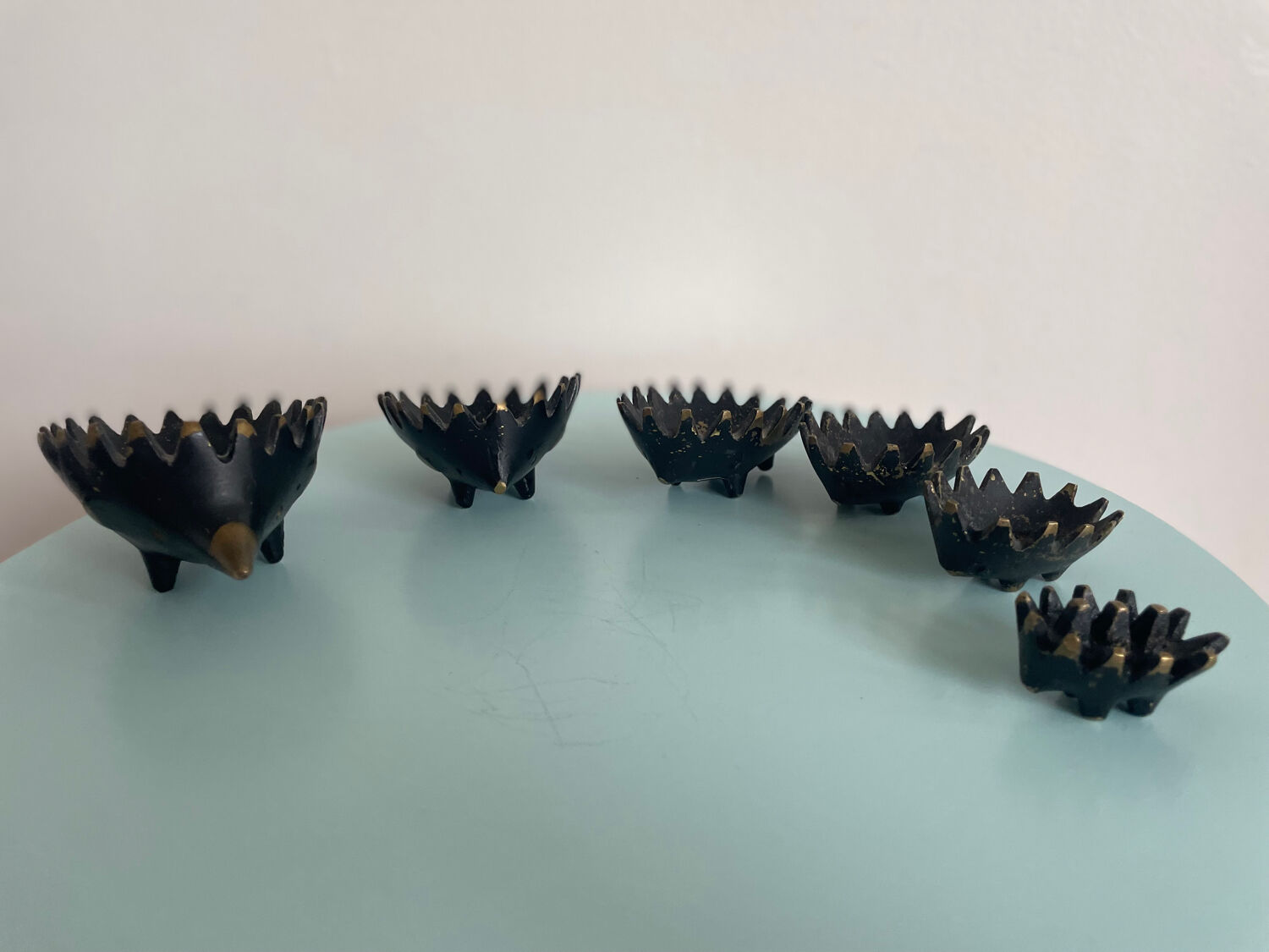 Set of 6 stackable bronze hedgehogs — Walter Bosse, 1920s