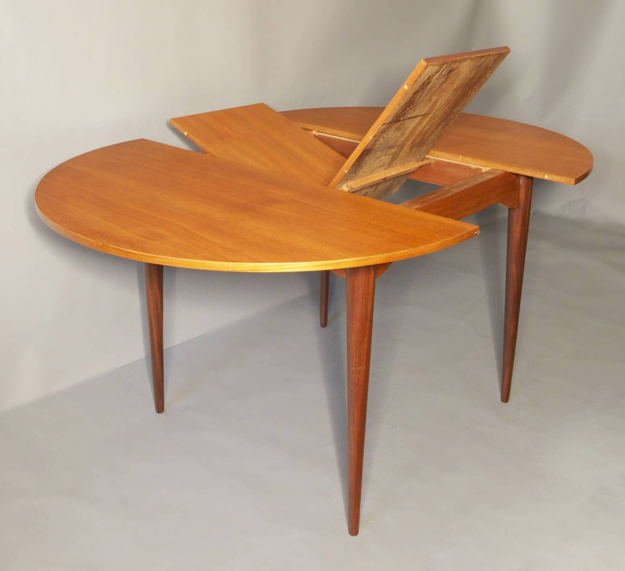 Italian circular teak extendable dining table, 1960s