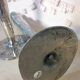 Pair of hammered metal candlesticks