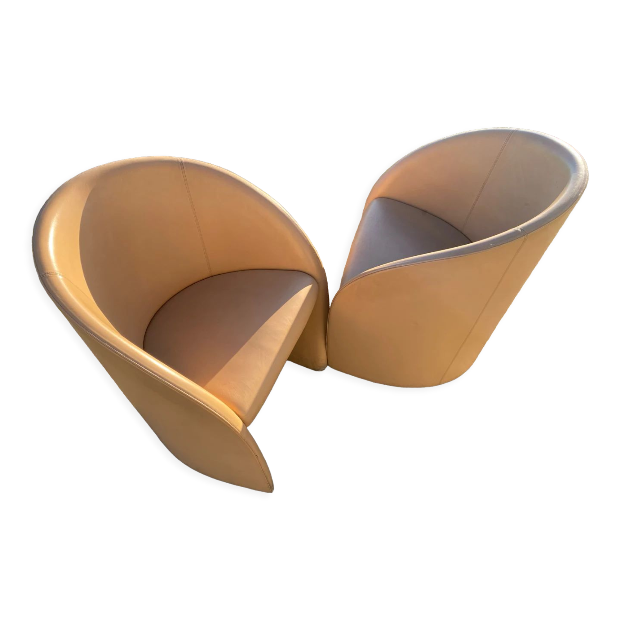 Pair of designer leather armchairs