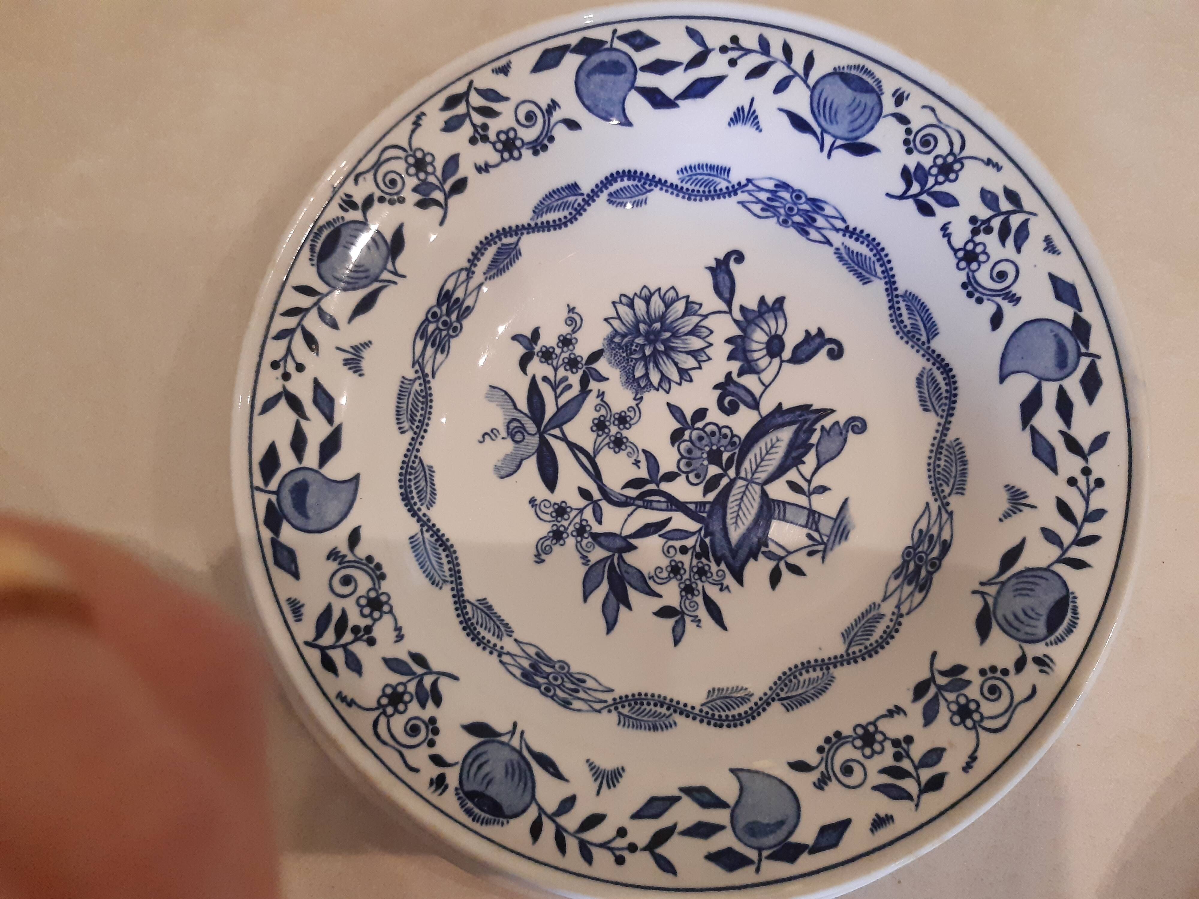 Set of two plates, flat and deep, with a country blue decoration.