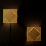 Golden wall light Raak