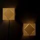Golden wall light Raak