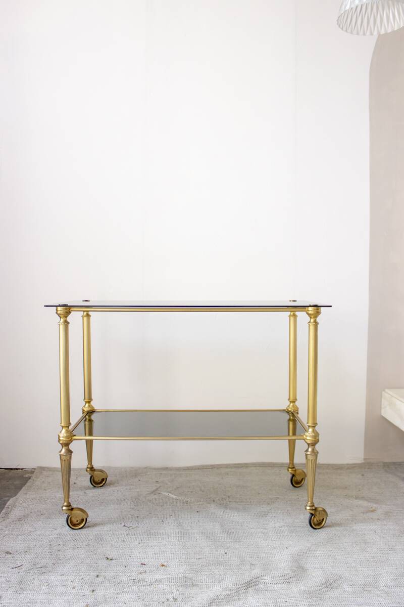 Gold metal and smoked glass server