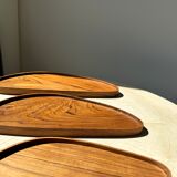 Trio of rounded triangular shaped trays or cups in monoxyl teak