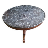 Round pedestal table with marble top and mahogany tripod from the 19th century