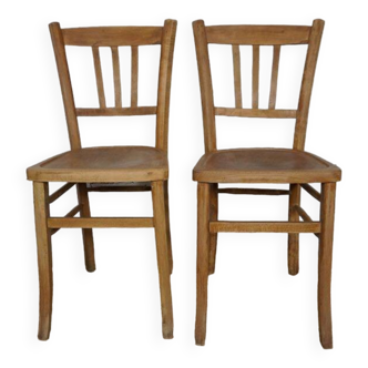 Pair of Luterma raw wood bistro chairs