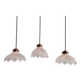 Trio of Art Deco pendant lights in scalloped transparent glass, 1920s-30s