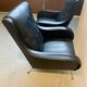2 vintage faux leather armchairs