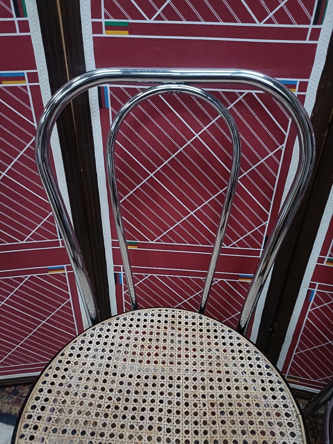 4 chaises bistrot en acier chromé et assise cannée