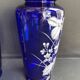 Pair of numbered white enamelled cobalt blue blown glass vases