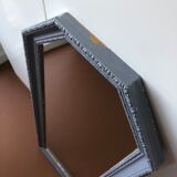 Old patinated mirror golden gray