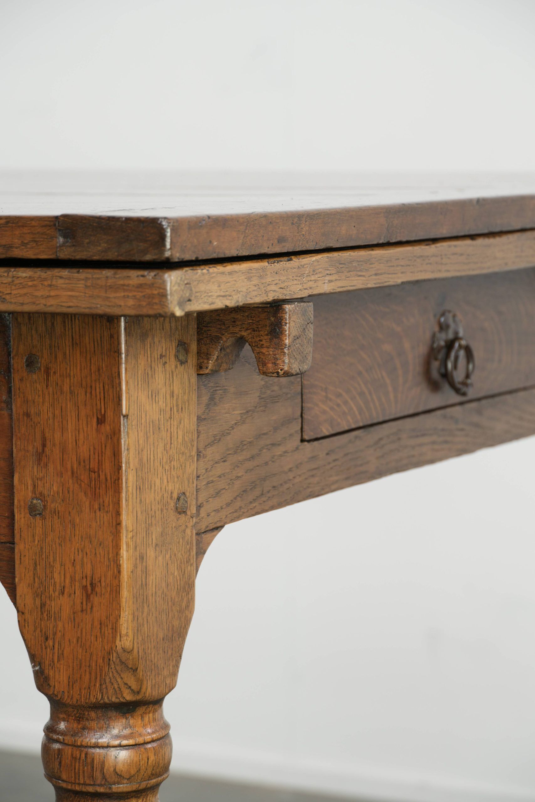 Antique oak dining table from the late 18th century with extendable leaves
