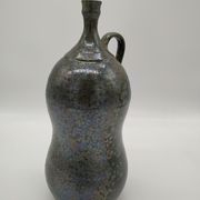Bottle in iridescent green sandstone from the ceramist jean aimé Poirier