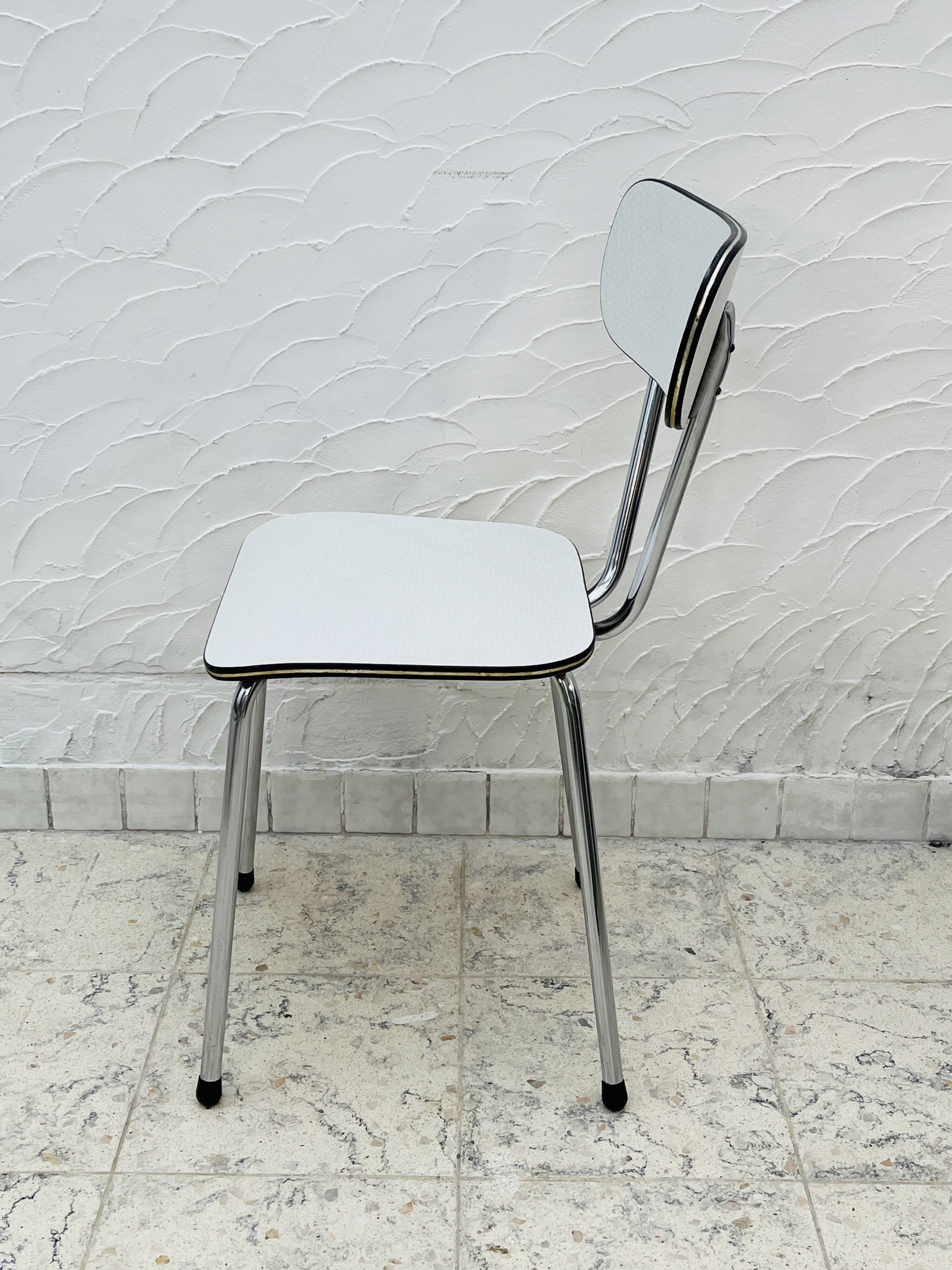 Set of 4 vintage grey chrome Formica kitchen chairs.