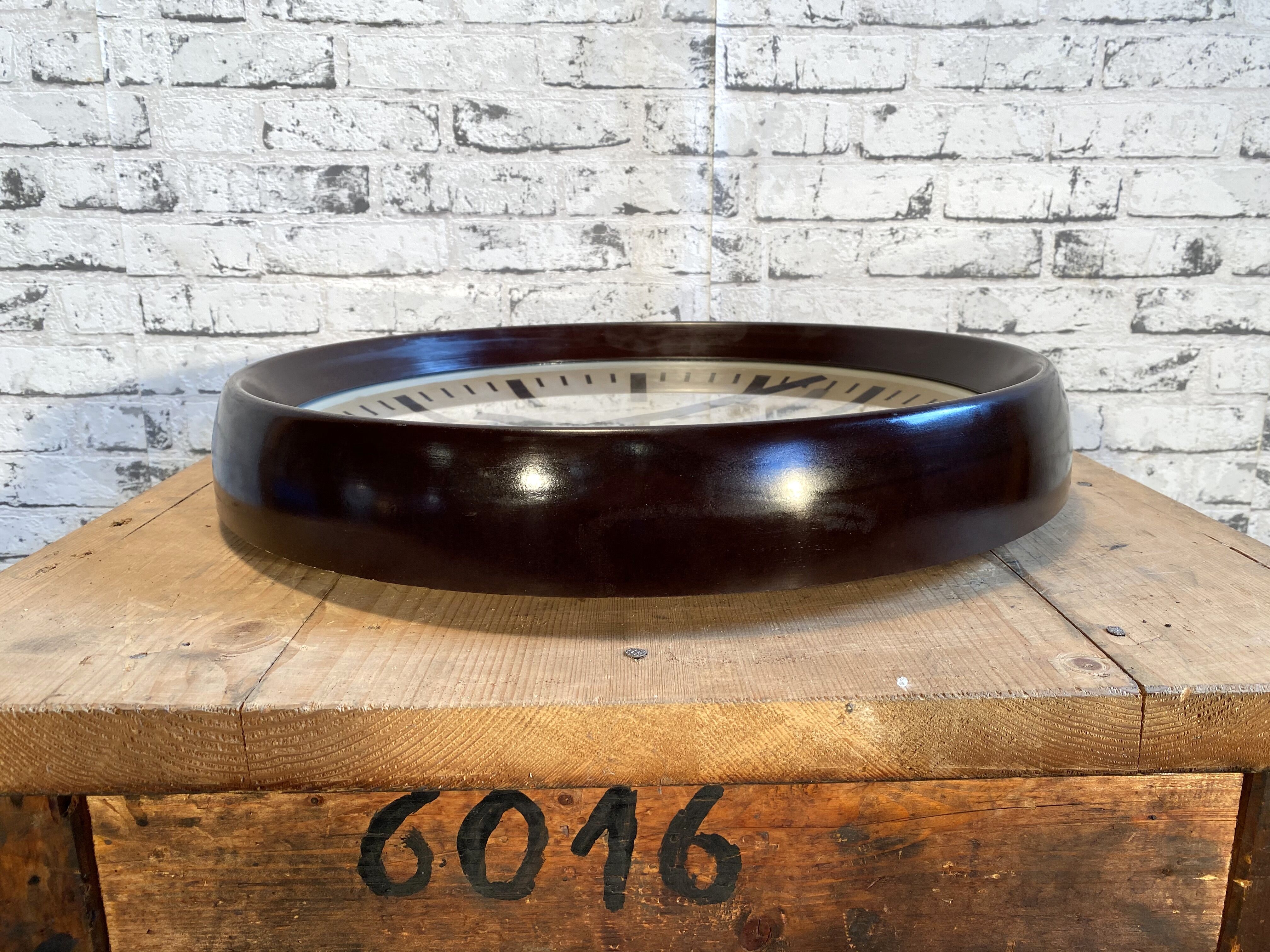 Industrial bakelite factory wall clock from Pragotron, 1960s