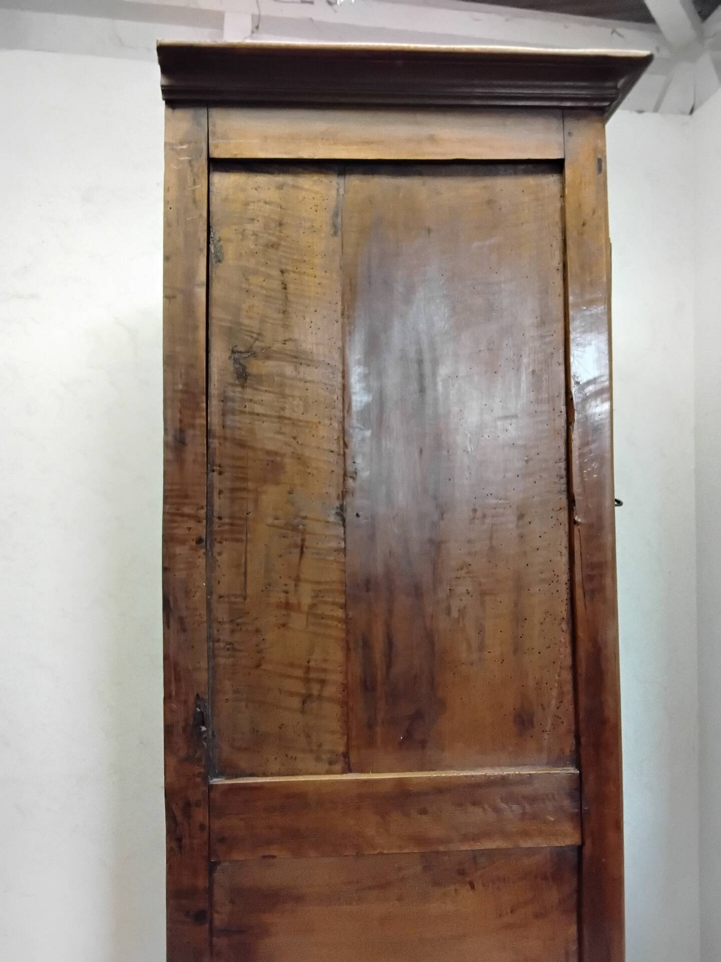 Antique wardrobe standing man