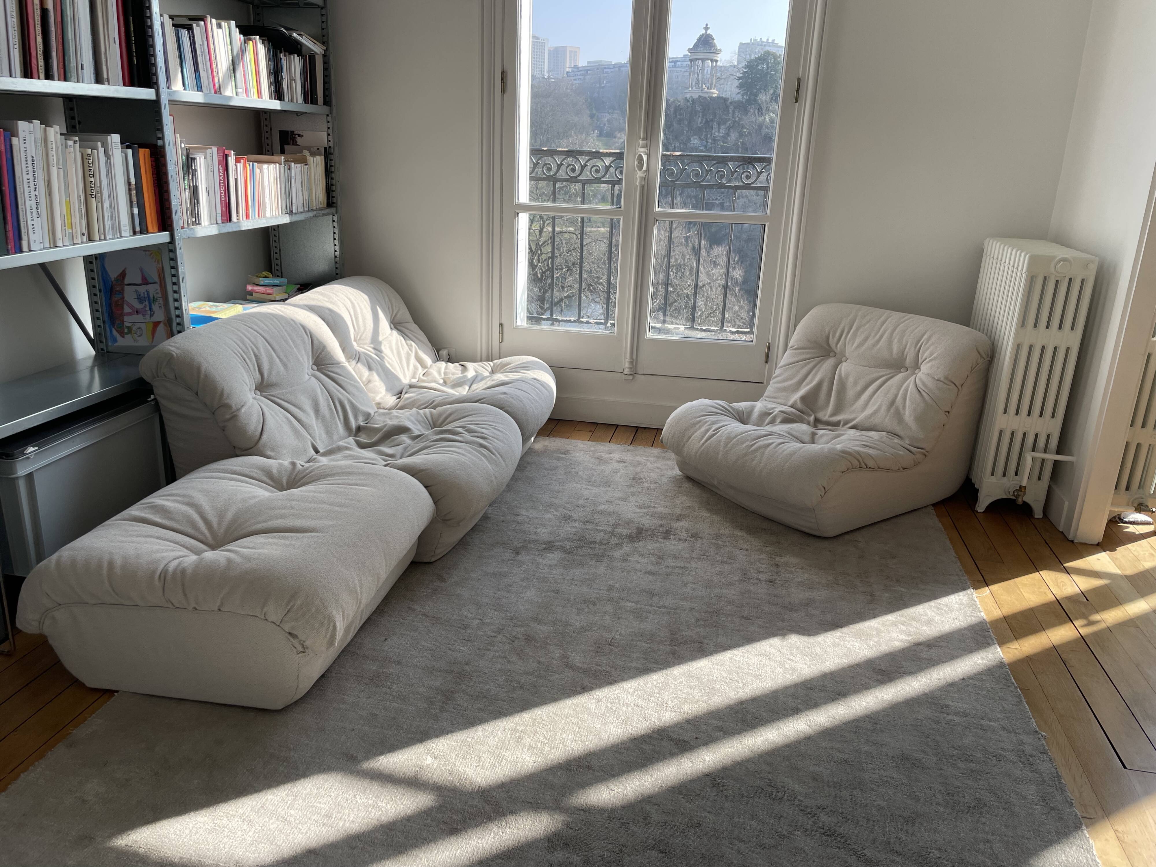 Modular sofa with 3 armchairs and an ottoman.