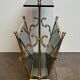 Brass magazine rack and blue-tinted glasses
