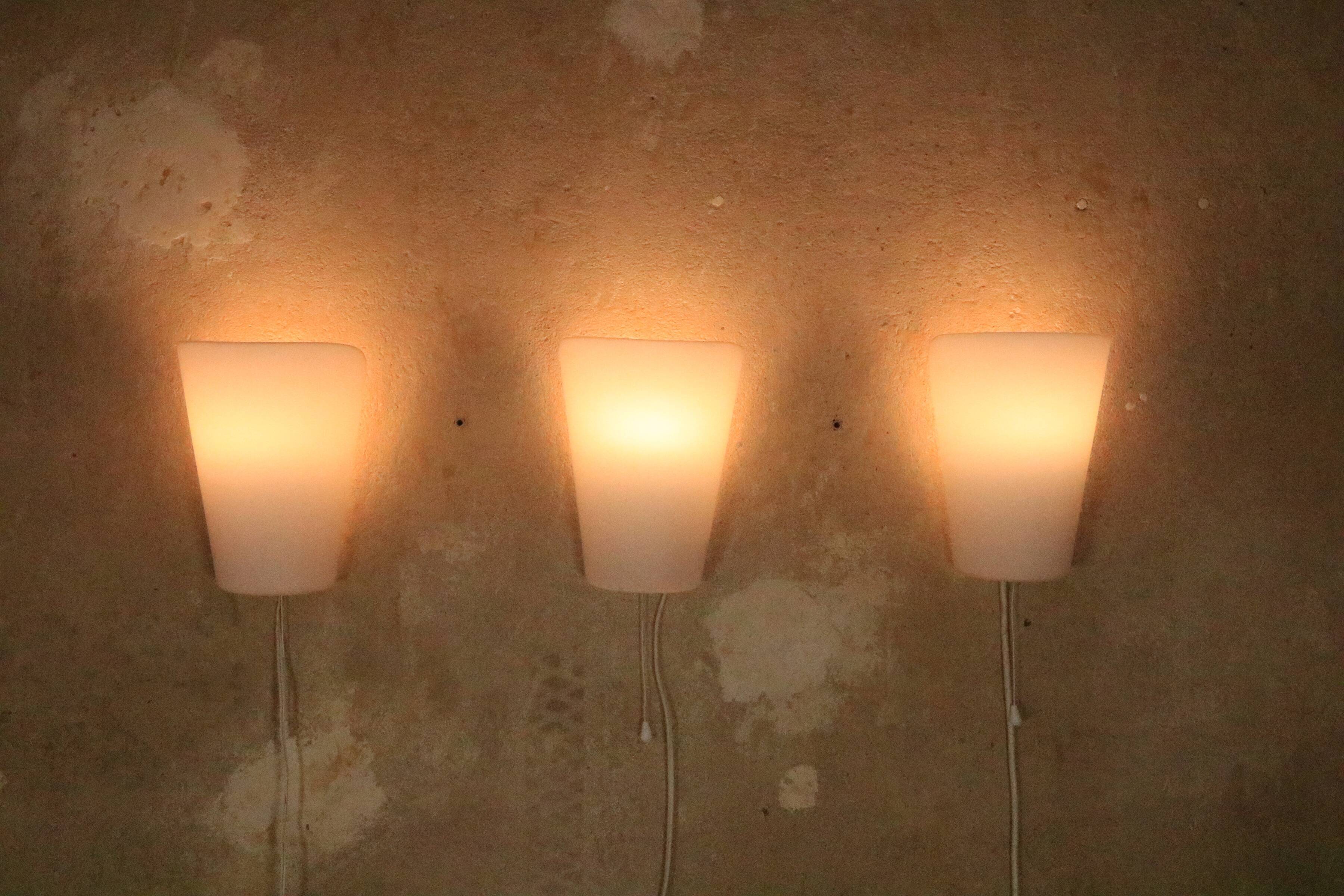 3 wall lamps by Wilhelm Wagenfeld for Peill & Putzler, "Media", 1950s