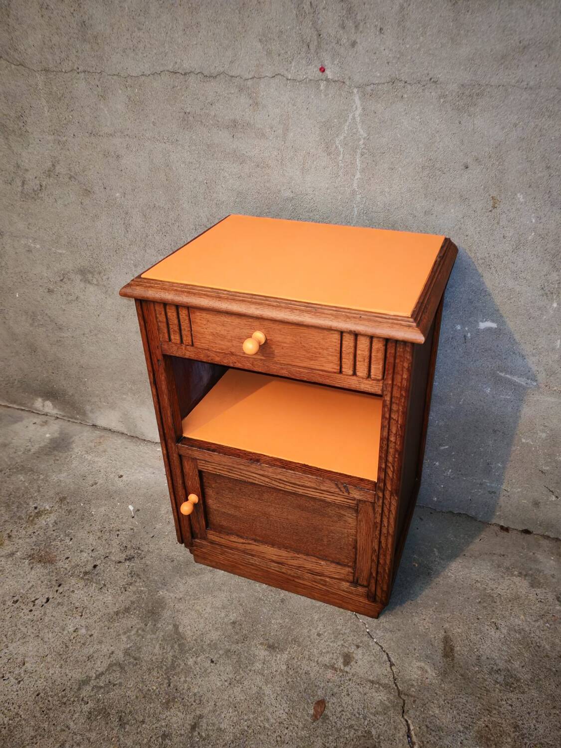 Art Deco orange bedside table