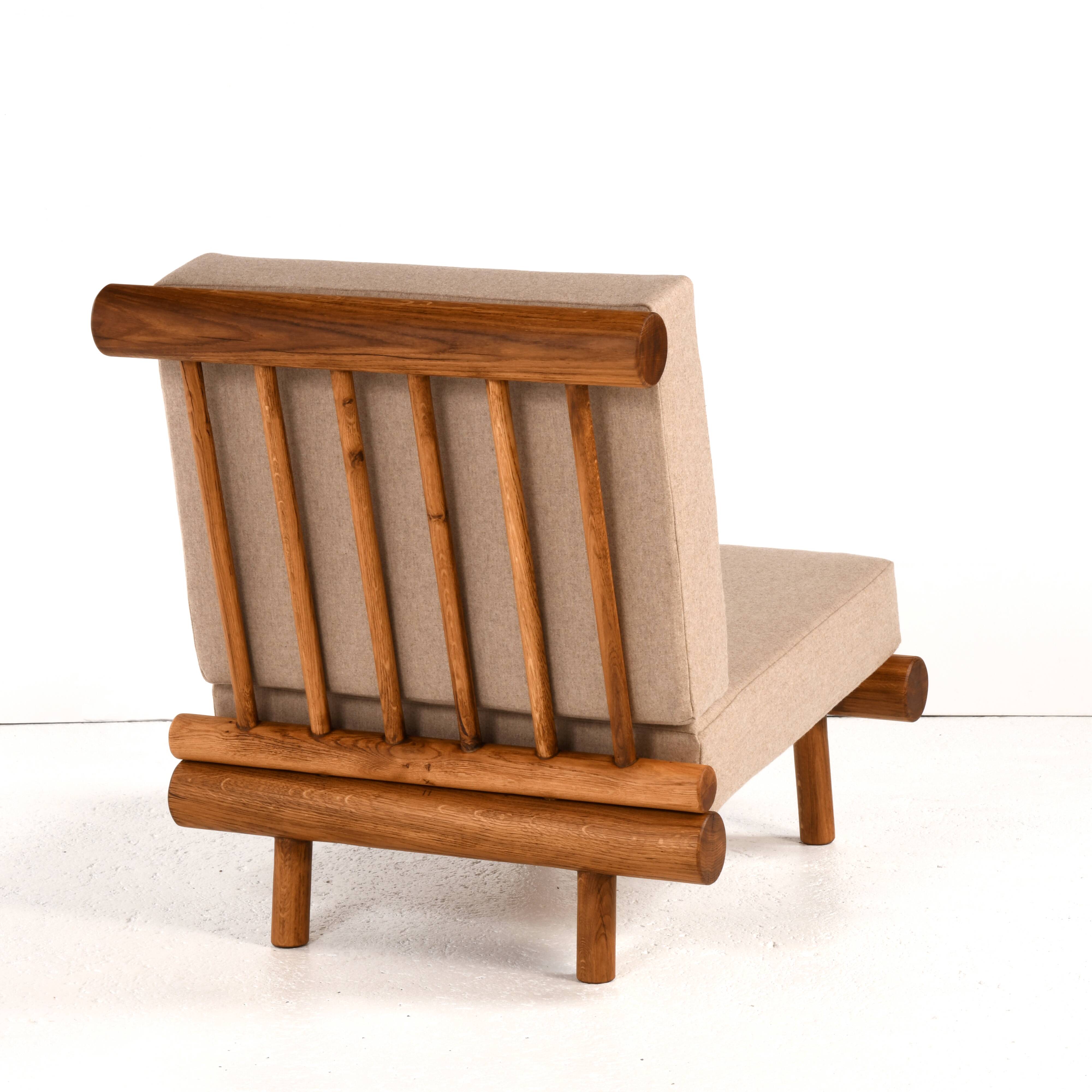 Pair of low chairs called La cachette selected by Charlotte Perriand