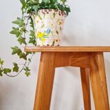 Wooden stool with tapered legs
