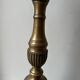Gilded bronze candlestick with cherub trio decoration
