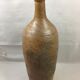 Old bottle in varnished sandstone glazed vintage
