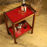 Serving in varnished chestnut and red leather