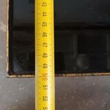 Vintage cast iron and black glass side table