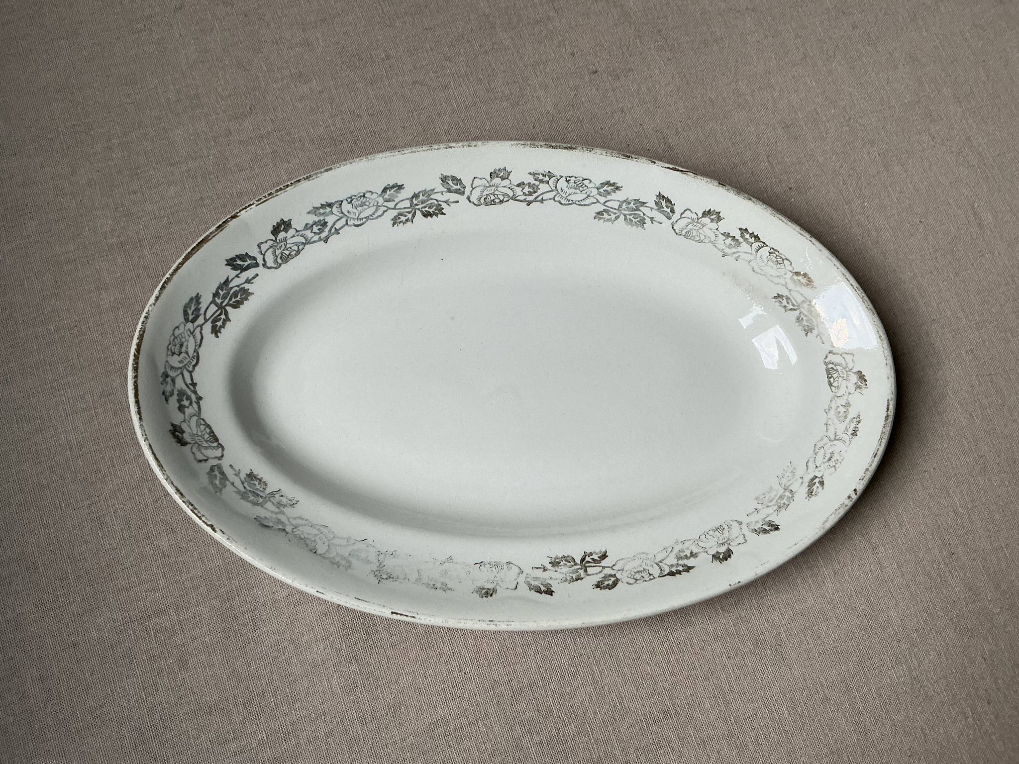 Antique oval plate Moulin des Loups Orchies – grey and gold floral decoration