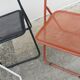 Set of 4 vintage perforated metal folding chairs 1970-80 red, white and black