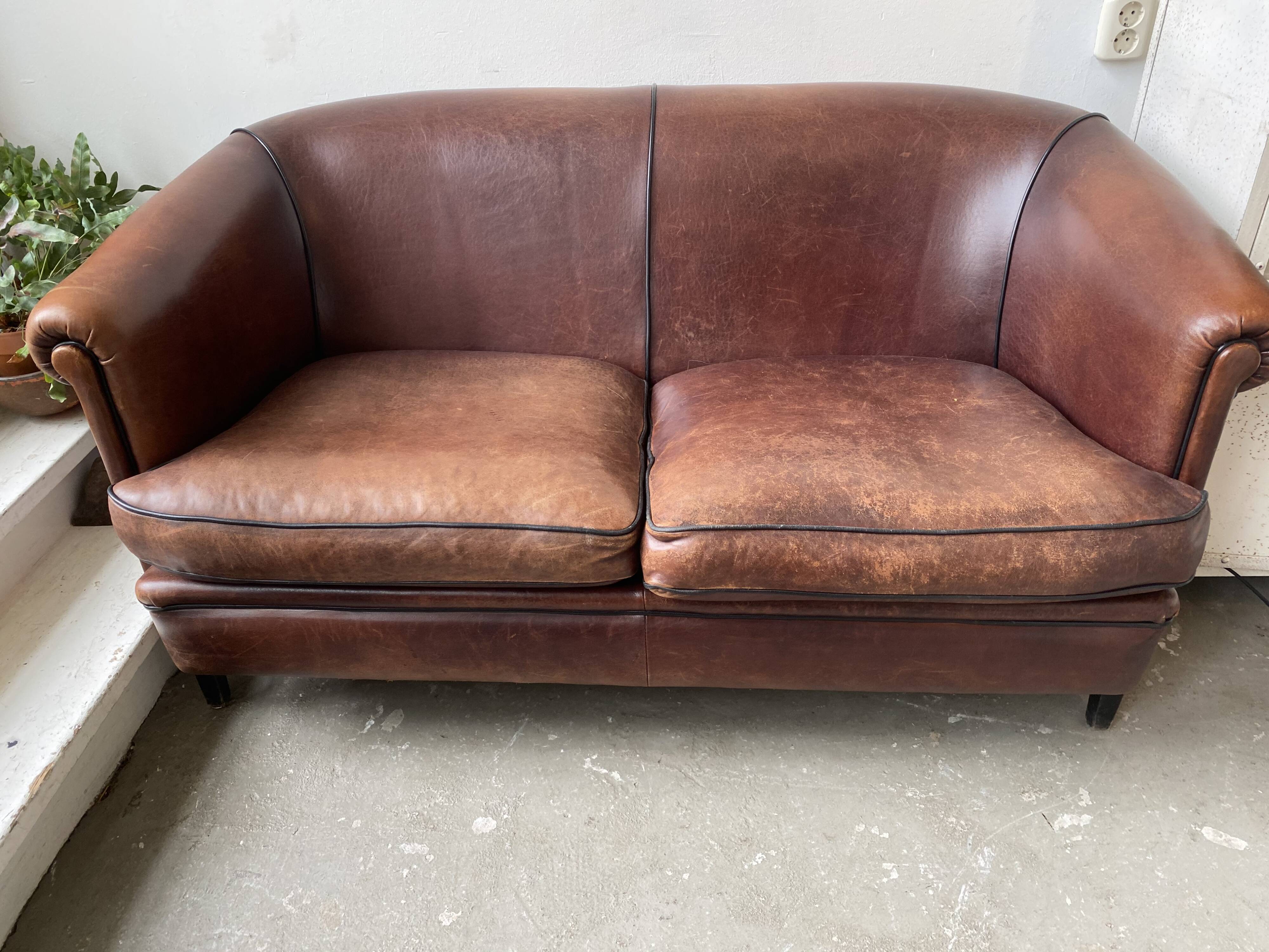 Canapé deux places vintage en cuir