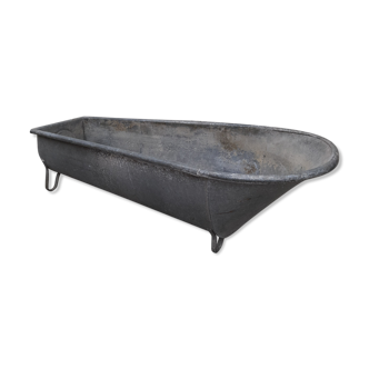 Ancient galvanized zinc bathtub